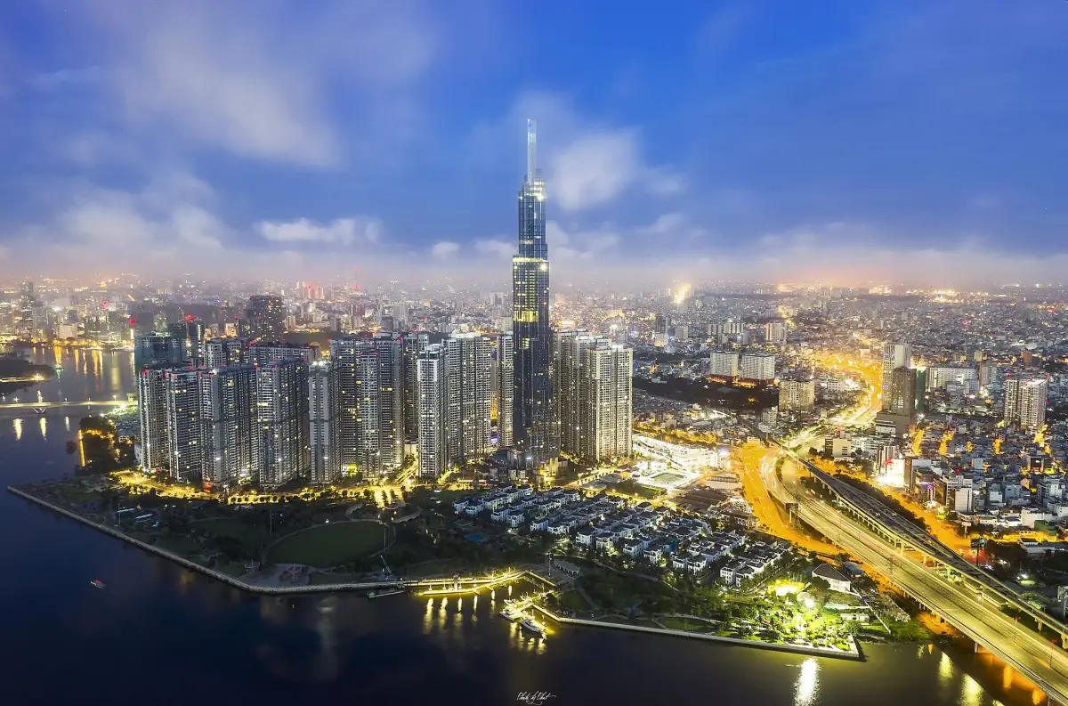 Aerial view of the Saigon skyline and river in the evening light