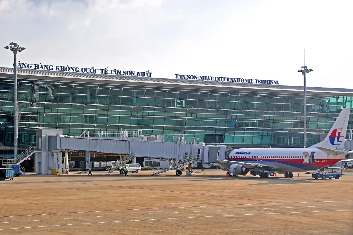 Tan Son Nhat International Terminal building with an aircraft at the gate